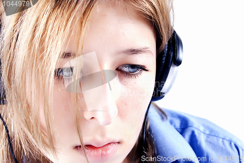 Image of Young girl in headphones   