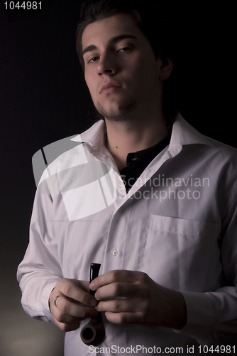 Image of portrait of a young man with pipe