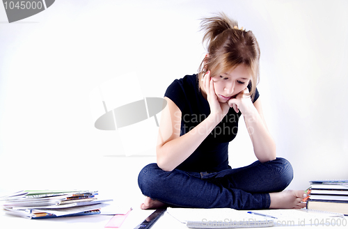 Image of girl spending time in studying 