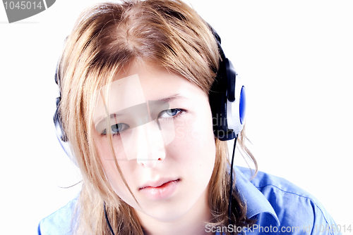 Image of Young girl in headphones   