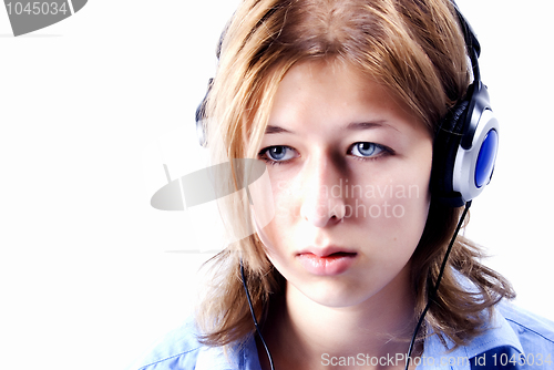 Image of Young girl in headphones   