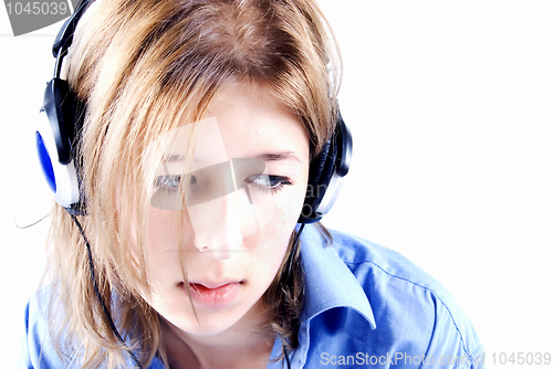 Image of Young girl in headphones  