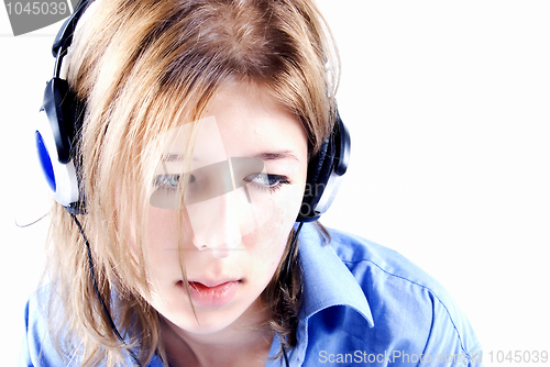 Image of Young girl in headphones  