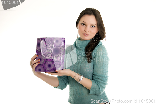 Image of Young girl with shopping bag