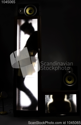 Image of A girl behind the glass door          