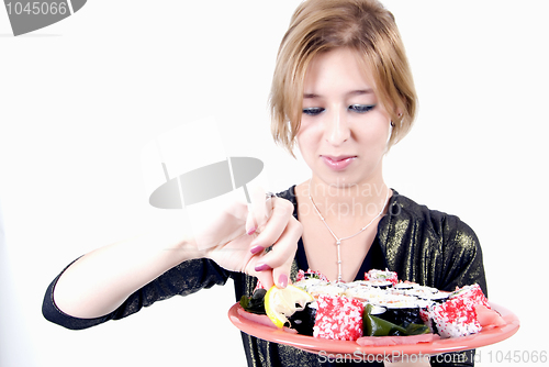 Image of girl with sushi  