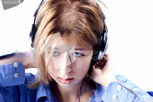 Image of Young girl  in headphones 