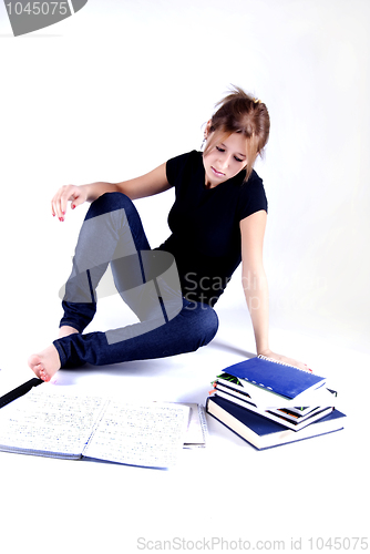 Image of girl spending time in studying 