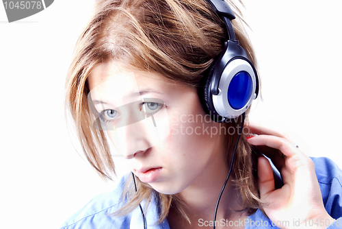 Image of Young girl in headphones  