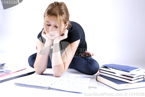 Image of girl spending time in studying 