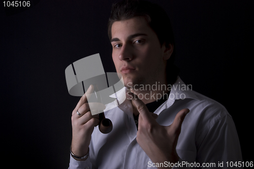 Image of portrait of a young man with pipe 