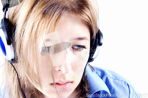 Image of Young girl in headphones