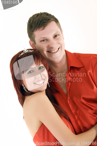 Image of Young couple in red