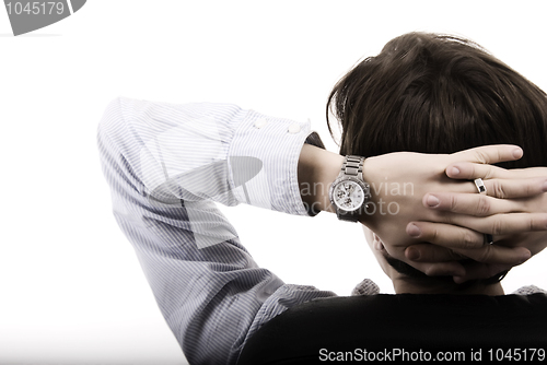 Image of Man resting in the arm-chair