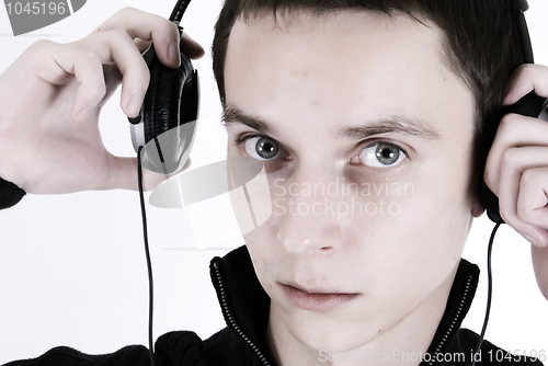 Image of Young man in headphones   