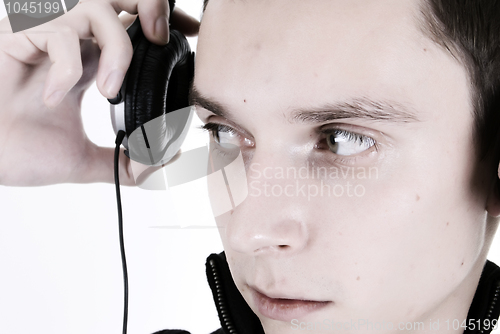 Image of Young man in headphones  