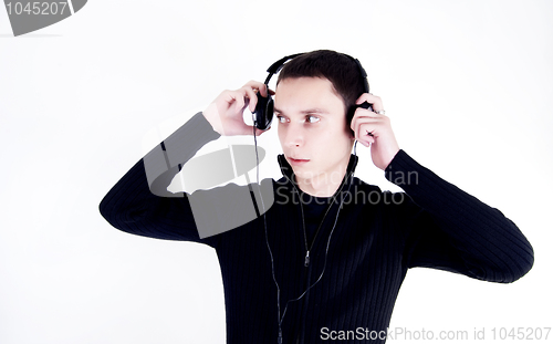 Image of Young man in headphones   