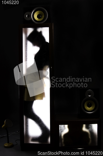 Image of A girl behind the glass door           