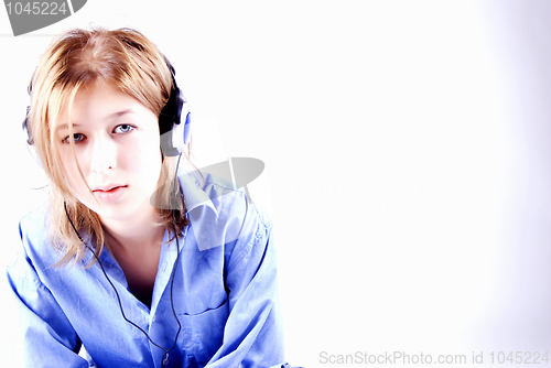 Image of Young girl in headphones   