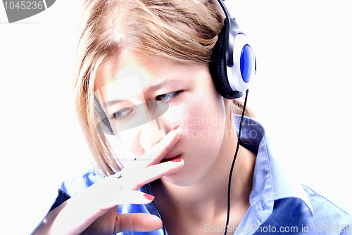 Image of Young girl in headphones  