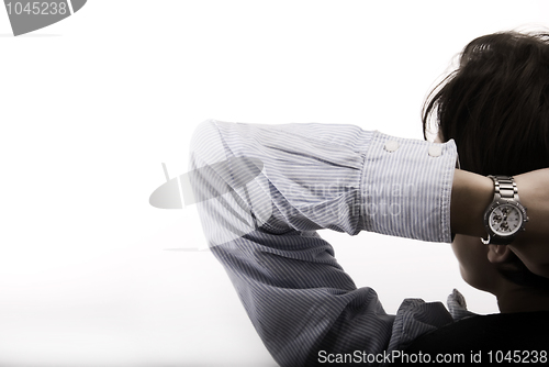 Image of Man resting in the arm-chair