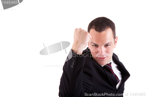 Image of business man with arm raised in victory sign