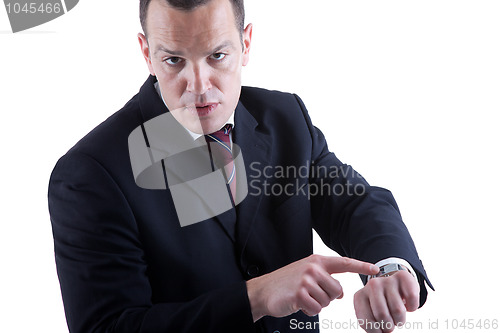 Image of businessman pointing to the watch,