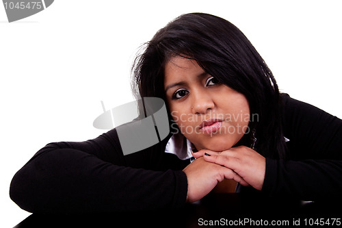 Image of thinking large  latin woman