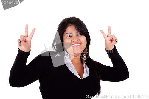 Image of happy large  latin woman, with thumbs raised as a sign of victory