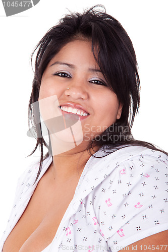 Image of happy and casually dressed large  latin woman