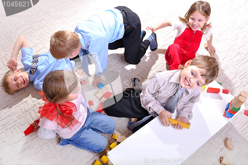 Image of happy friends playing