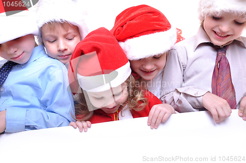 Image of Christmas children with a banner