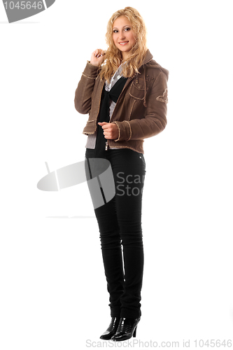 Image of Smiling young blonde in a black pants