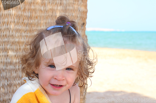 Image of little girl on beach