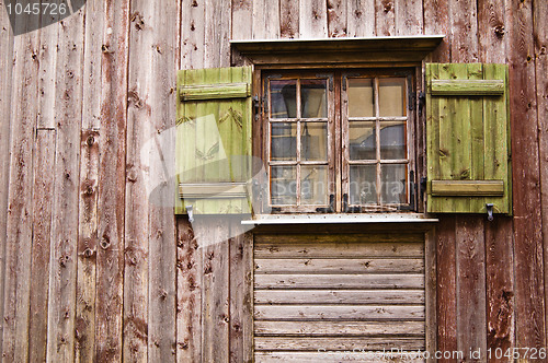 Image of Old wooden window with shutters