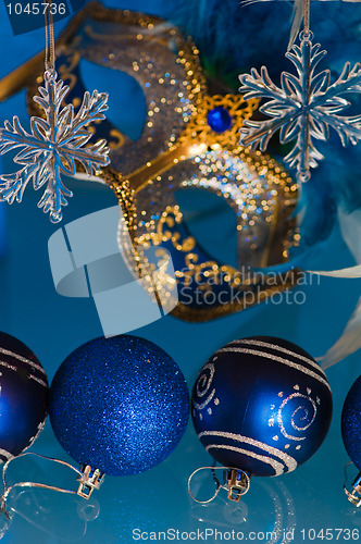 Image of  New Year's and Christmas ornaments and a carnival a mask