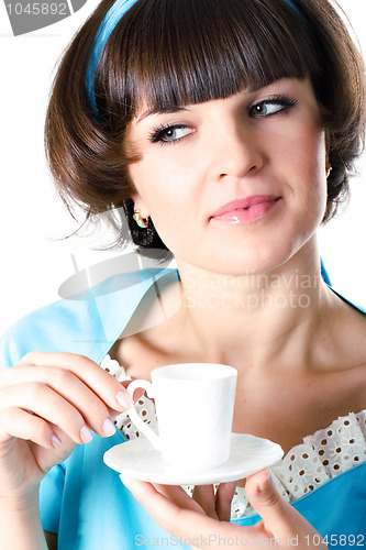 Image of woman enjoying a cup of coffee