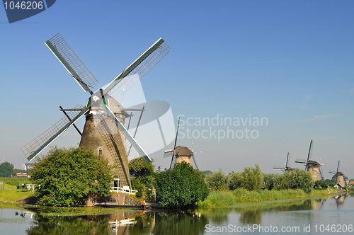 Image of Dutch mills over a river