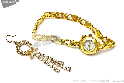 Image of Golden watch and earring