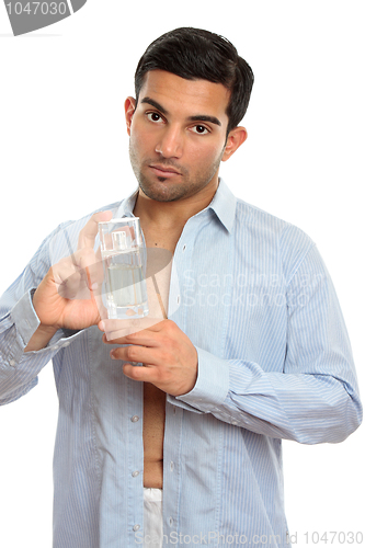 Image of Man showing perfume cologne fragrance