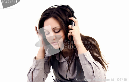 Image of Young girl in headphones  