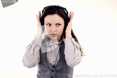 Image of Young girl in headphones   