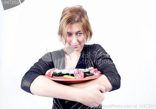 Image of girl with sushi  