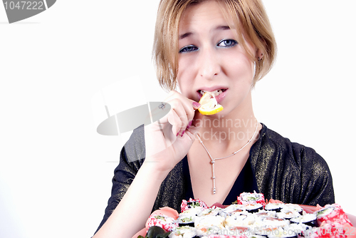 Image of girl with sushi  