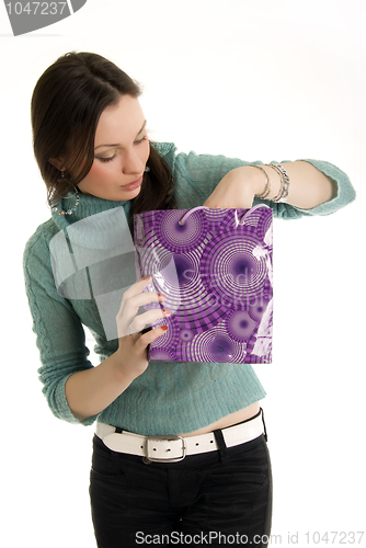 Image of Young girl with shopping bag