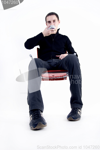 Image of young man with a cup of tea 