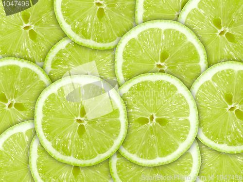 Image of Abstract green background with citrus-fruit of lime slices