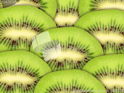 Image of Abstract green background with raw kiwi slices