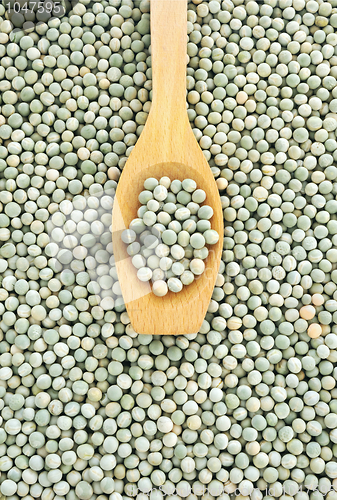 Image of Wooden spoon and dried green split peas