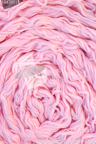 Image of Sphere of pink wool with needles